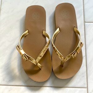 Tory Burch flip flops with Gold shimmer, size 8